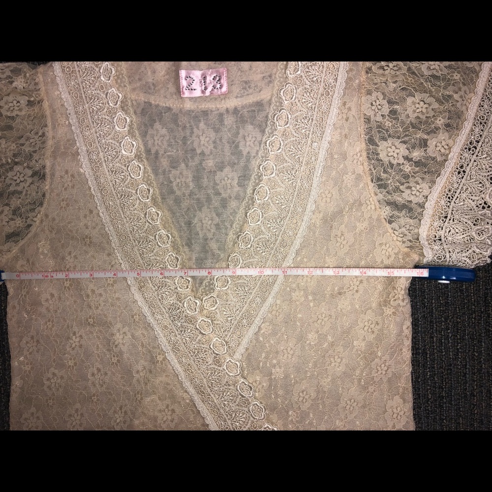 Super feminine lace wrap shirt. Hangs really well. - Picture 8 of 8